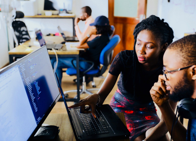 image: office workers, in office working, on computer